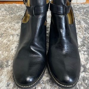 Nine West black leather cutout booties.